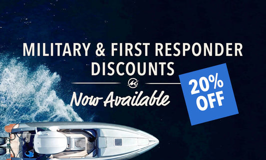 Military Discounts Now Available - overhead view of a boat in motion in dark blue water